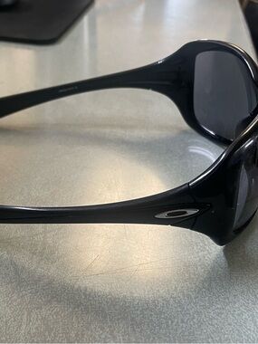 Women’s used Oakley sunglasses. Lenses are scratch but can be replaced